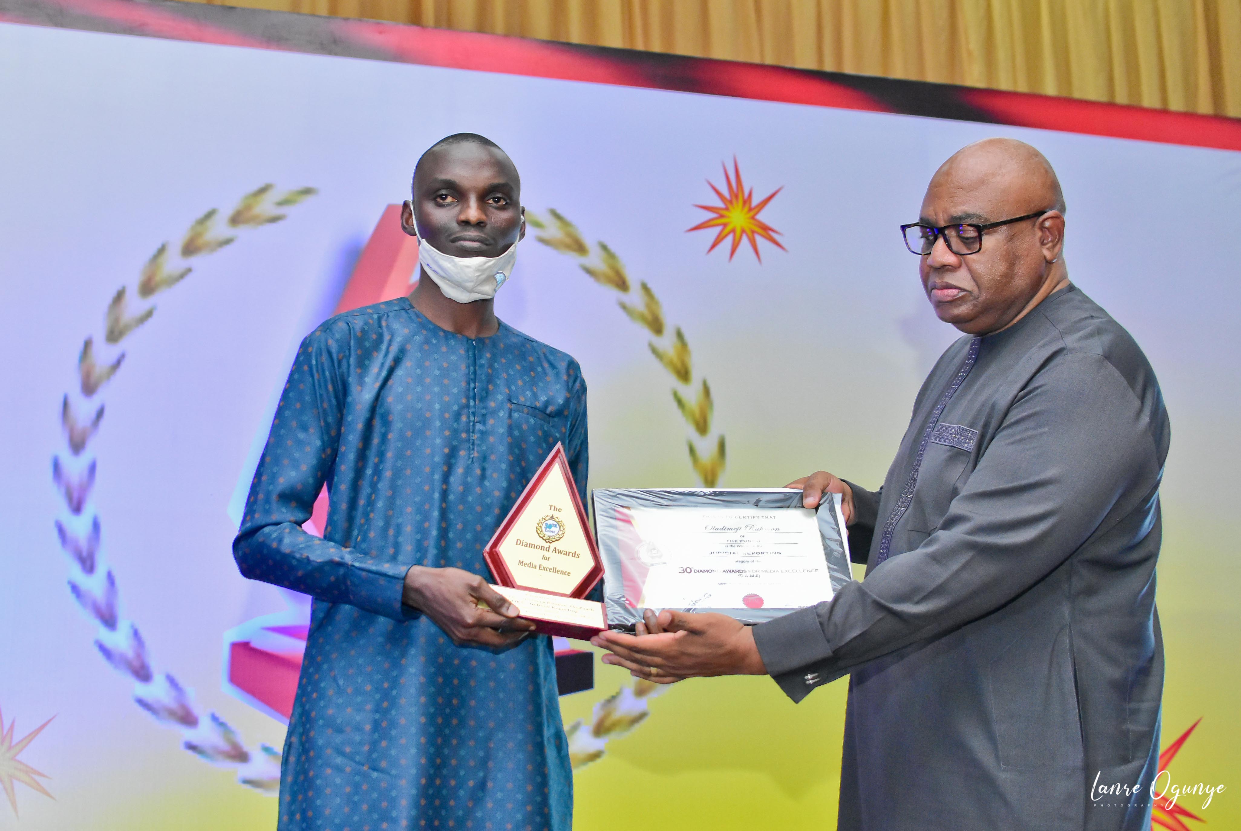 <span  class="uc_style_uc_tiles_grid_image_elementor_uc_items_attribute_title" style="color:#ffffff;">Judicial Reporting Hanafi standing in for Oladimeji Ramon receives prize from Jide Onalaja</span>